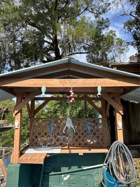 Exterior - 6125 Beacon Point Dr, Weeki Wachee, FL 34607 photo 5 of 7