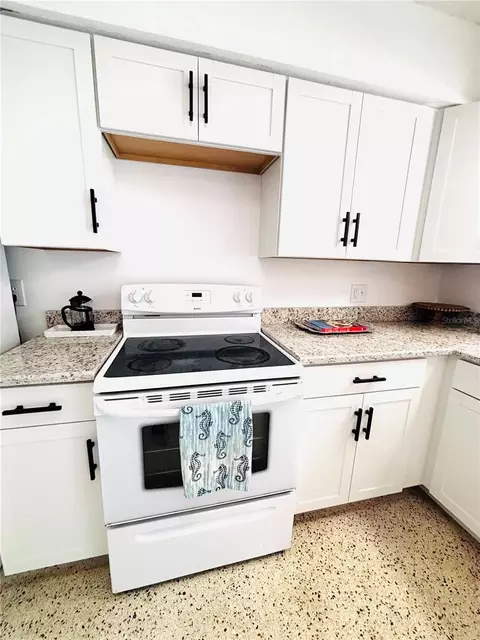 Kitchen - 6125 Beacon Point Dr, Weeki Wachee, FL 34607 photo 2 of 4