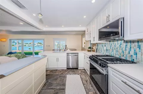 Kitchen - 14223 E Parsley Dr, Madeira Beach, FL 33708 photo 2 of 10