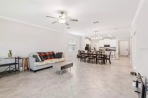 Living - 24928 Lambrusco Loop, Lutz, FL 33559 photo 3 of 13