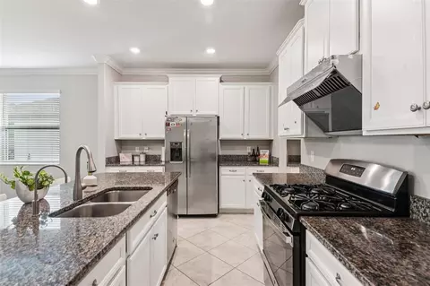 Kitchen - 24928 Lambrusco Loop, Lutz, FL 33559 photo 2 of 13