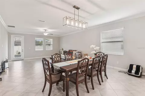 Dining - 24928 Lambrusco Loop, Lutz, FL 33559 photo 4 of 10
