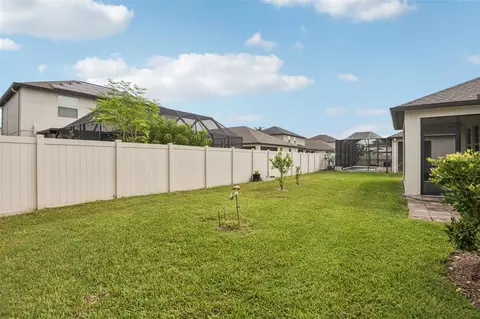 Exterior - 24928 Lambrusco Loop, Lutz, FL 33559 photo 8 of 13