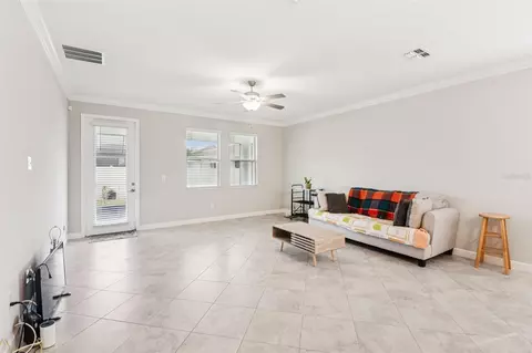 Living - 24928 Lambrusco Loop, Lutz, FL 33559 photo 2 of 13