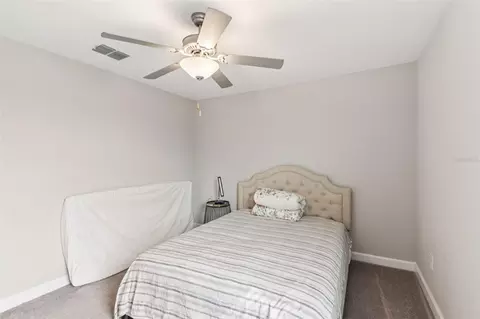 Bedroom - 24928 Lambrusco Loop, Lutz, FL 33559 photo 10 of 18