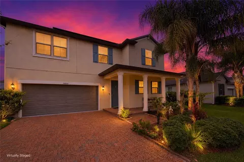 Exterior - 24928 Lambrusco Loop, Lutz, FL 33559 photo 2 of 13