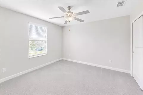 Bedroom - 24928 Lambrusco Loop, Lutz, FL 33559 photo 14 of 18