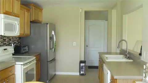Kitchen - 11774 Tempest Harbor Loop, Venice, FL 34292 photo 2 of 5