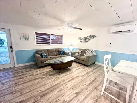 Living - 4016 Eagle Nest Dr, Hernando Beach, FL 34607 photo 6 of 7