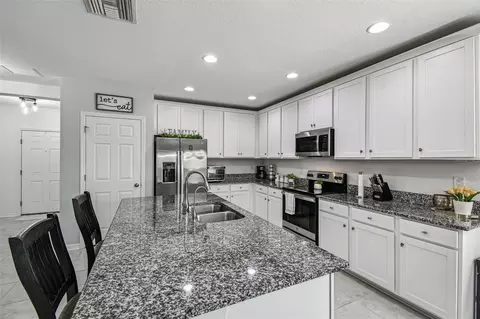 Kitchen - 12907 Conquistador Loop, Spring Hill, FL 34610 photo 3 of 8