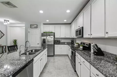 Kitchen - 12907 Conquistador Loop, Spring Hill, FL 34610 photo 4 of 8