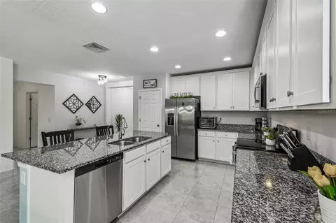 Kitchen - 12907 Conquistador Loop, Spring Hill, FL 34610 photo 5 of 8