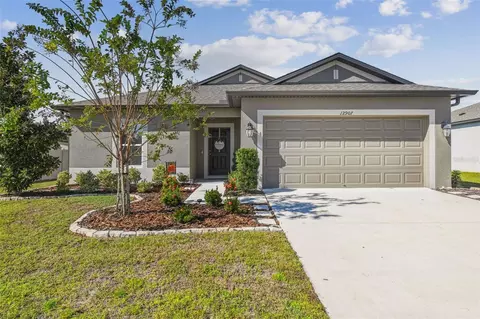 Exterior - 12907 Conquistador Loop, Spring Hill, FL 34610 photo 3 of 15