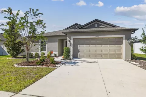 Exterior - 12907 Conquistador Loop, Spring Hill, FL 34610 photo 2 of 15