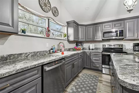 Kitchen - 748 Mcclellan Rd, Frostproof, FL 33843 photo 2 of 3