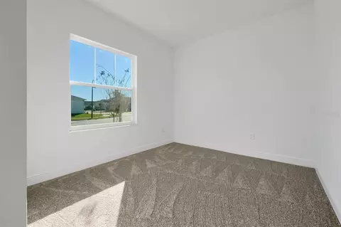 Bedroom - 5745 Wallis Ln, Saint Cloud, FL 34771 photo 6 of 9