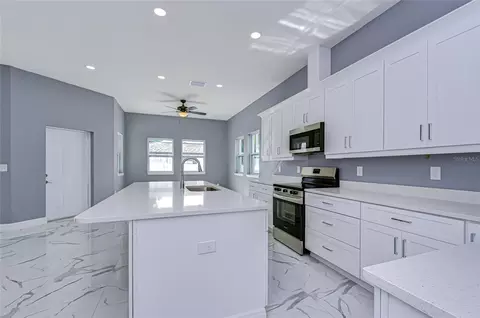 Kitchen - 5312 76th Ave N, Pinellas Park, FL 33781 photo 7 of 8