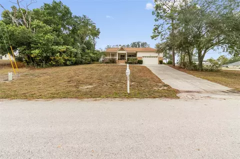 Exterior - 5301 Merrifield Ct, Spring Hill, FL 34608 photo 2 of 9