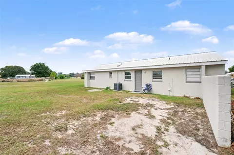 Exterior - 45 Queens Ct, Frostproof, FL 33843 photo 5 of 7