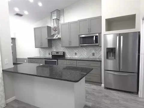 Kitchen - 2113 Springmeadow Dr, Spring Hill, FL 34606 photo 4 of 8