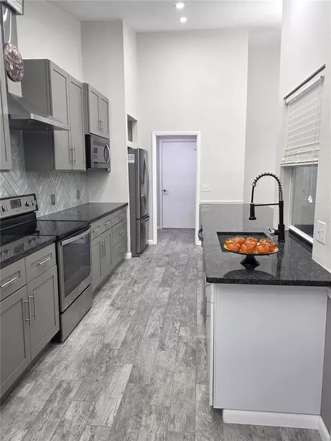 Kitchen - 2113 Springmeadow Dr, Spring Hill, FL 34606 photo 2 of 8