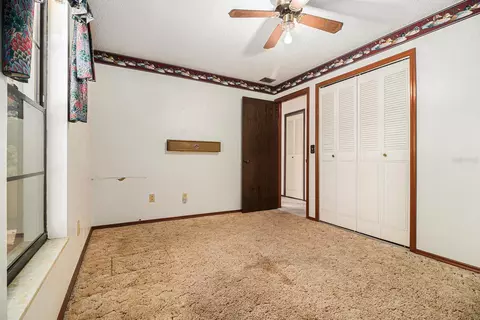 Bedroom - 607 E Lakeshore Dr, Ocoee, FL 34761 photo 4 of 5