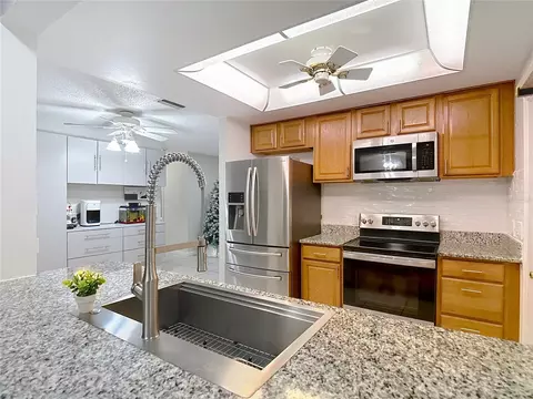 Kitchen - 9171 Vicksburg Rd, Spring Hill, FL 34608 photo 6 of 7