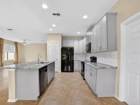 Kitchen - 348 Cedar Falls Dr, Apollo Beach, FL 33572 photo 1 of 2