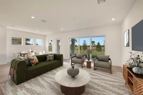 Living - 17972 Foxtail Loop, Venice, FL 34293 photo 2 of 5