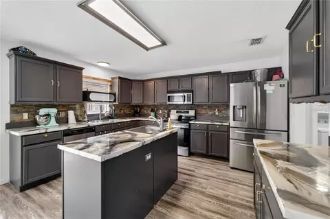 Kitchen - 10325 Frog Pond Dr, Riverview, FL 33569 photo 2 of 7
