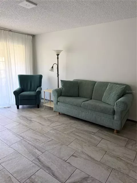 Living - 1100 E Bay Dr #35, Largo, FL 33770 photo 3 of 3