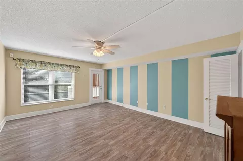 Living - 131 Bluff View Dr #403, Belleair Bluffs, FL 33770 photo 4 of 5