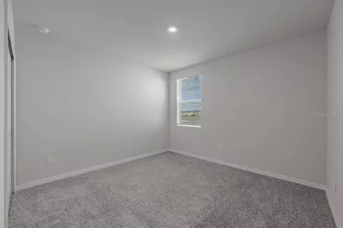 Bedroom - 7041 Feather River Pl, Parrish, FL 34219 photo 5 of 5