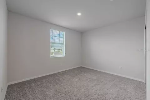 Bedroom - 7041 Feather River Pl, Parrish, FL 34219 photo 3 of 5