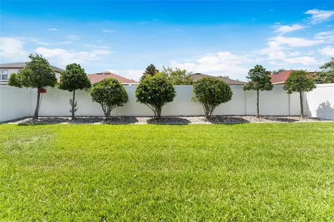 Exterior - 2849 Maple Brook Loop, Lutz, FL 33558 photo 9 of 13