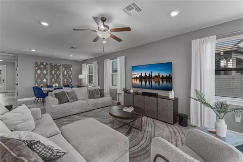Living - 7430 Pool Compass Loop, Wesley Chapel, FL 33545 photo 4 of 4