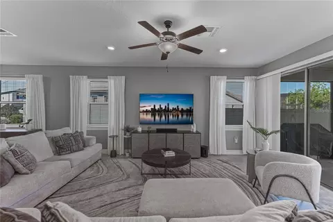 Living - 7430 Pool Compass Loop, Wesley Chapel, FL 33545 photo 3 of 4