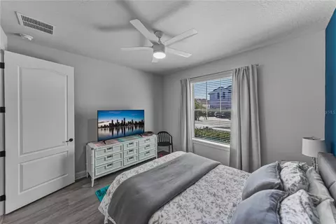 Bedroom - 7430 Pool Compass Loop, Wesley Chapel, FL 33545 photo 5 of 10