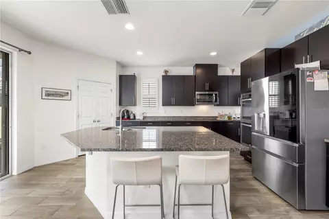 Kitchen - 1565 Feather Grass Loop, Lutz, FL 33558 photo 3 of 7
