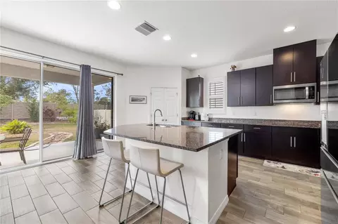 Kitchen - 1565 Feather Grass Loop, Lutz, FL 33558 photo 5 of 7
