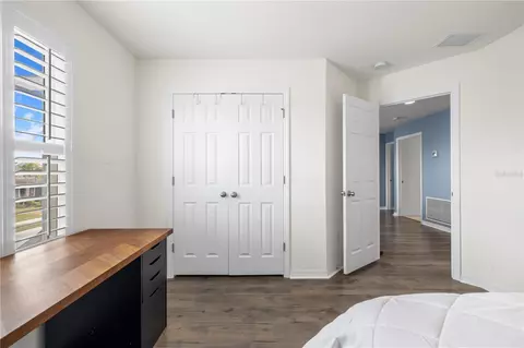 Bedroom - 1565 Feather Grass Loop, Lutz, FL 33558 photo 3 of 6
