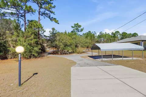 Exterior - 1724 E Mckinley St, Hernando, FL 34442 photo 5 of 8