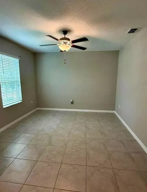 Living - 12957 Wildflower Meadow Dr, Riverview, FL 33579 photo 1 of 2
