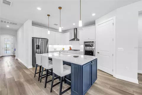 Kitchen - 8721 Ocean Tides Cv, Parrish, FL 34219 photo 4 of 11