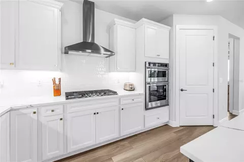 Kitchen - 8721 Ocean Tides Cv, Parrish, FL 34219 photo 10 of 11