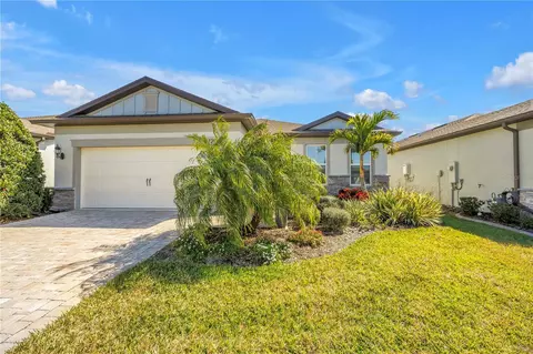 Exterior - 8721 Ocean Tides Cv, Parrish, FL 34219 photo 2 of 13