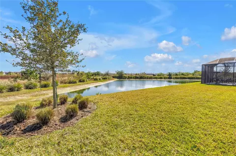Exterior - 8721 Ocean Tides Cv, Parrish, FL 34219 photo 8 of 13