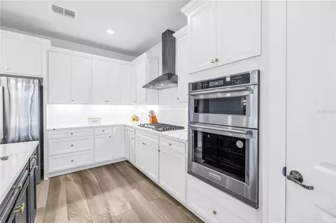 Kitchen - 8721 Ocean Tides Cv, Parrish, FL 34219 photo 11 of 11
