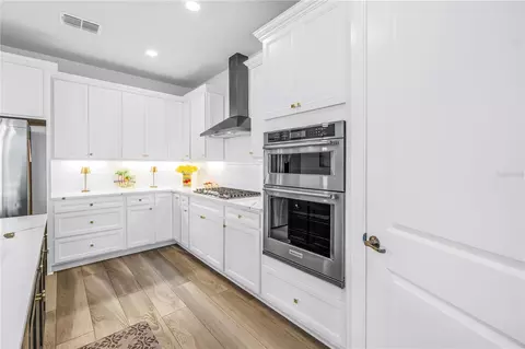 Kitchen - 8721 Ocean Tides Cv, Parrish, FL 34219 photo 5 of 11