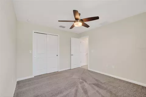 Bedroom - 4773 Magnetite Loop, Mount Dora, FL 32757 photo 6 of 8